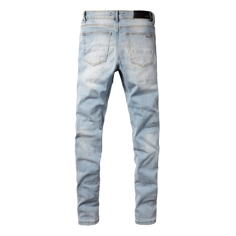 1307 European and American High Street Jeans Sticker Hand worn Ripped Jeans Slim fitting and Thin Small Feet Jeans