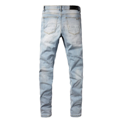 1307 European and American High Street Jeans Sticker Hand worn Ripped Jeans Slim fitting and Thin Small Feet Jeans