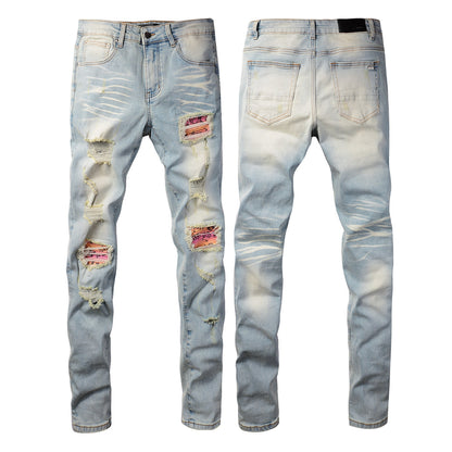 Men’s Light Blue Skinny Jeans with Heavy Distressing and Colorful Pink Patchwork Accents for a Bold Summer Look 589