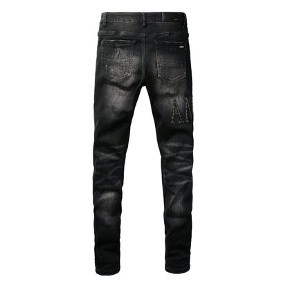 Rock-Inspired Distressed Black Jeans for Men Featuring Metallic Stud Lettering and Bold Torn Details 8823