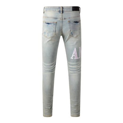 Jean skinny déchiré bleu clair pour homme avec empiècements contrastants roses et effet dégradé délavé 8885