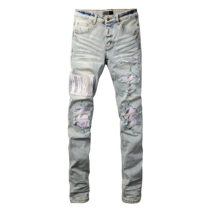 Jean skinny déchiré bleu clair pour homme avec empiècements contrastants roses et effet dégradé délavé 8885