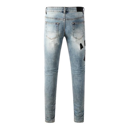 Men's Light Wash Slim-Fit Distressed Denim Jeans with Subtle Rips 8921