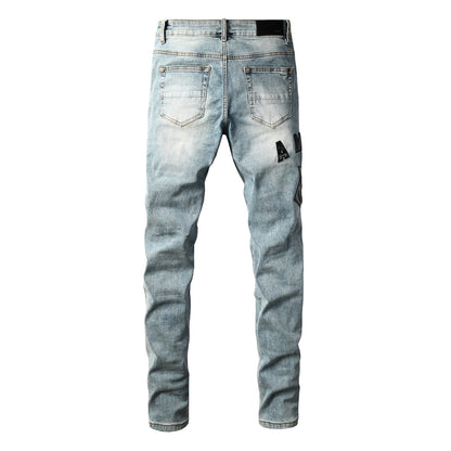 Men's Light Wash Slim-Fit Distressed Denim Jeans with Subtle Rips 8921