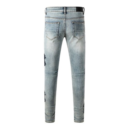 Men’s Light Blue Ripped Jeans with Cross Patch Design 8936