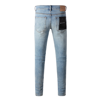 Fashionable Blue Ripped Jeans 9075 Featuring Distressed Design